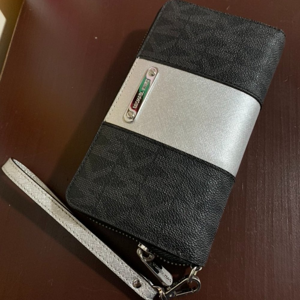 Michael Kors black and silver wristlet / wallet